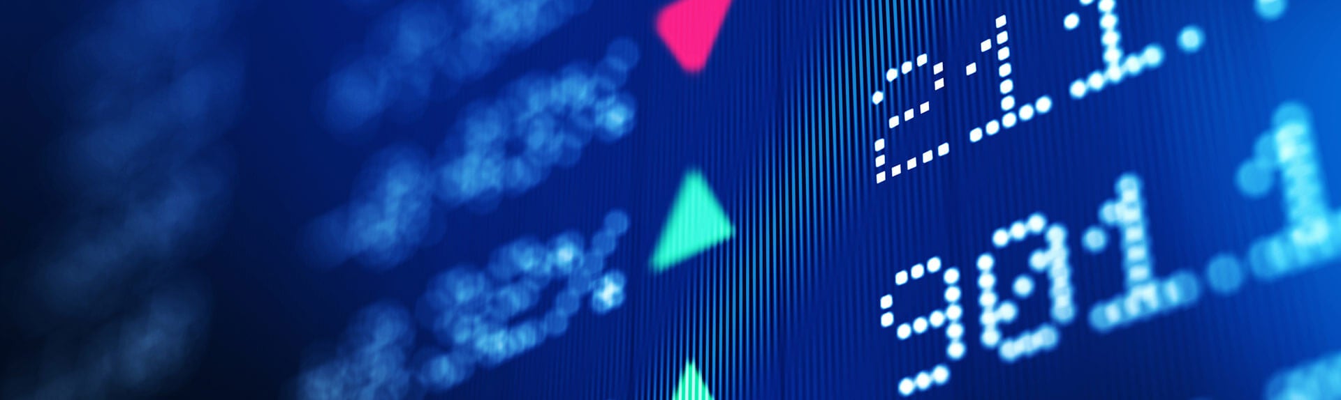 Close up image of stock ticker symbols