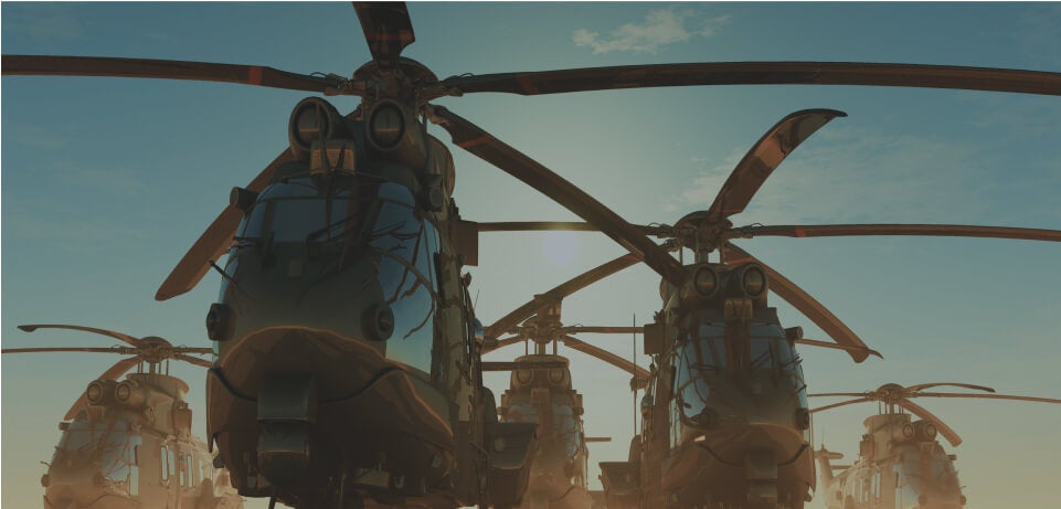 Stock photo image showing two grounded military helicopters in the foreground and two in the background.